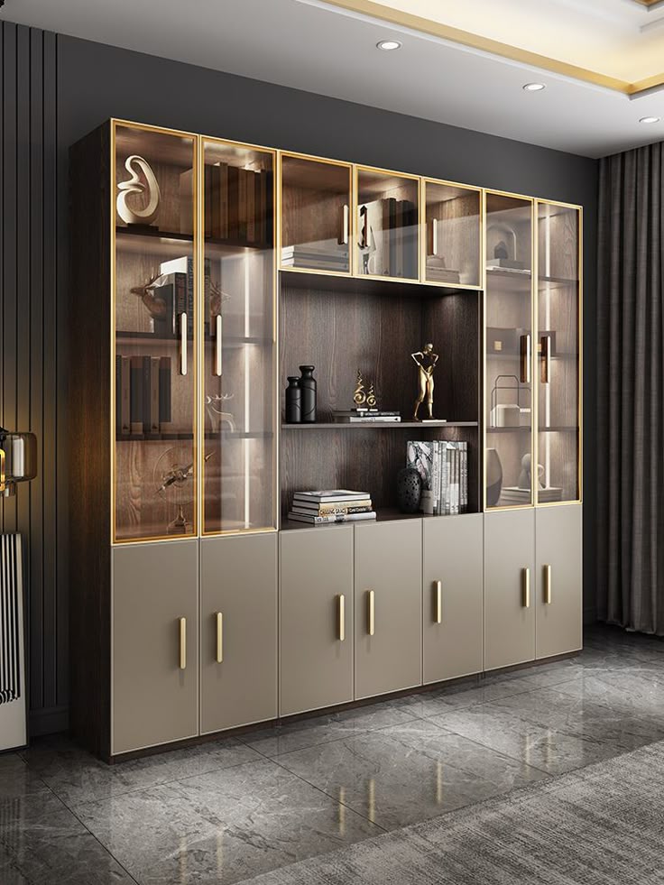 Elegant glass-front kitchen cabinet with gold trim, displaying neatly arranged crockery and glassware